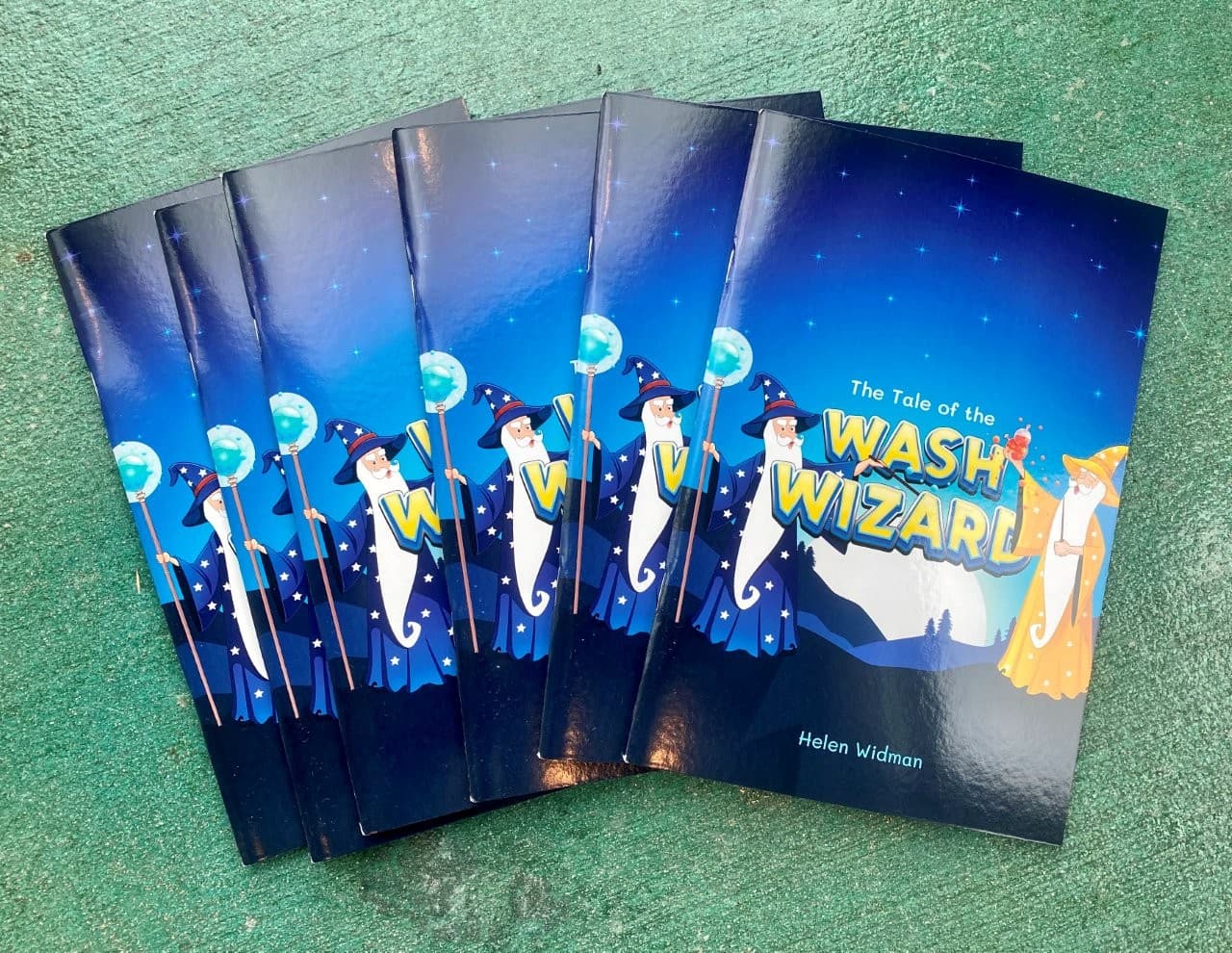Copies of The Tale of the Wash Wizard children's book